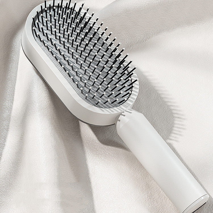 The SilkGlide™ Self-Cleaning Hairbrush