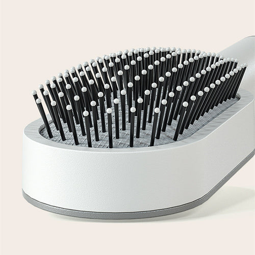 The SilkGlide™ Self-Cleaning Hairbrush